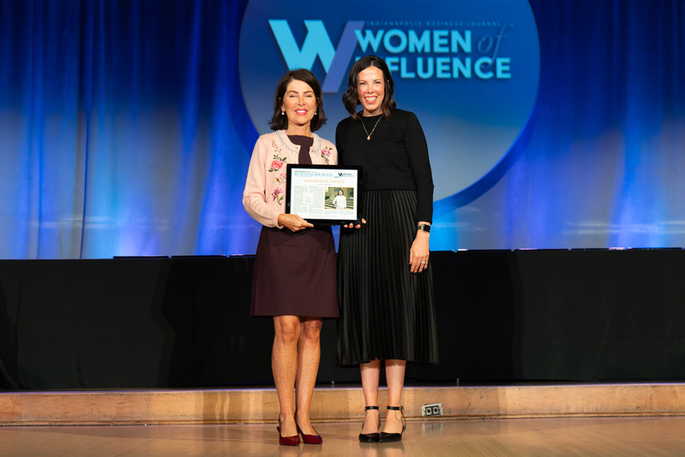 Janmarie O'Connor receiving the 2025 Women of Influence award
